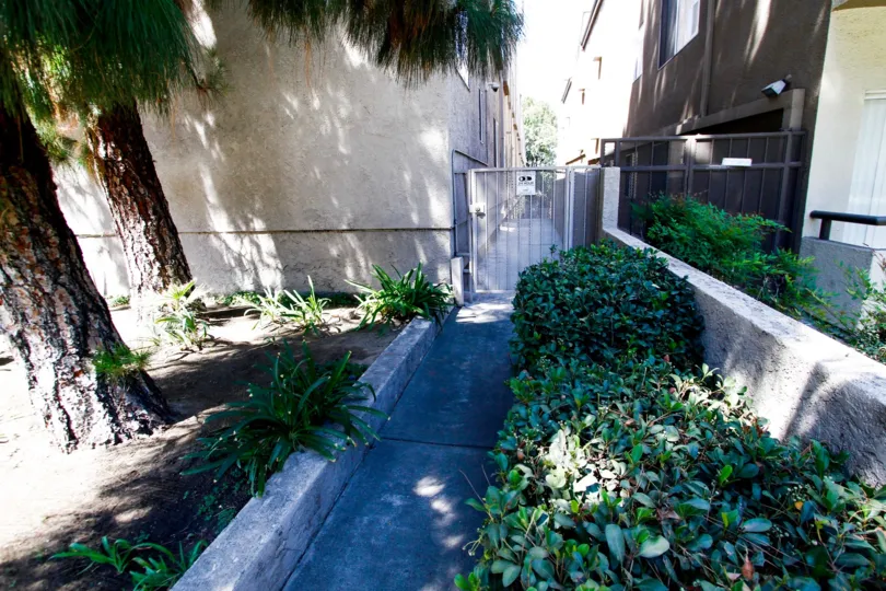 The walkway to the side of Bluffside Townhomes