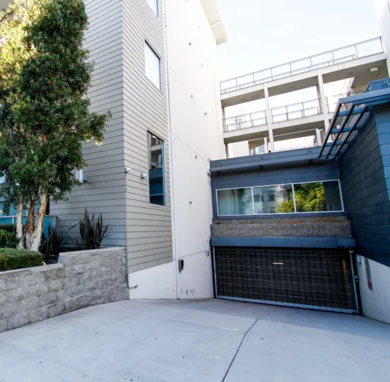 The gate for the parking garage for residents of Studio 837
