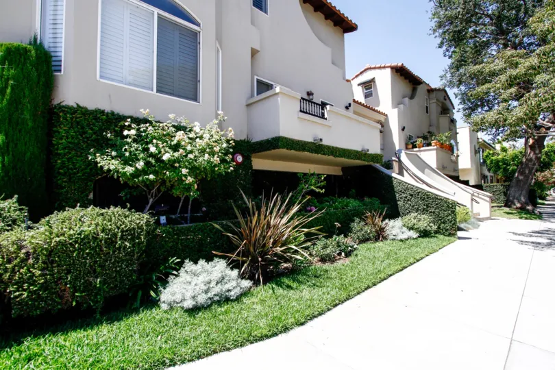 The sidewalk beside the Villas at Colfax