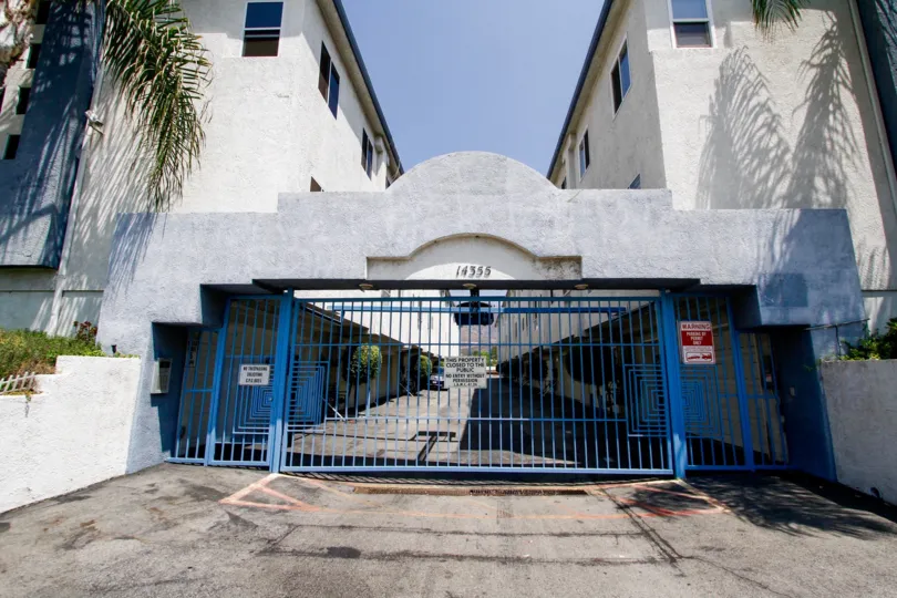 The gate into Olive View Village