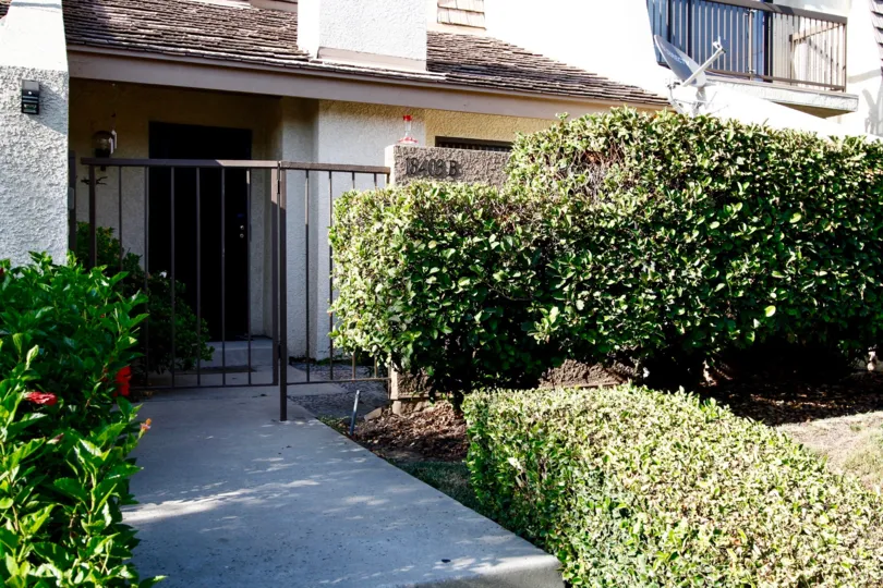 The fence seen around Tarzana Villas North