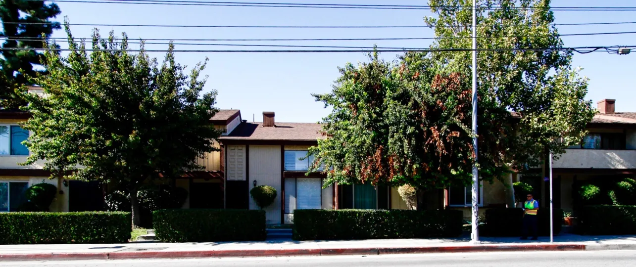 The sidewalk in front of Vanowen Forbes Townhomes