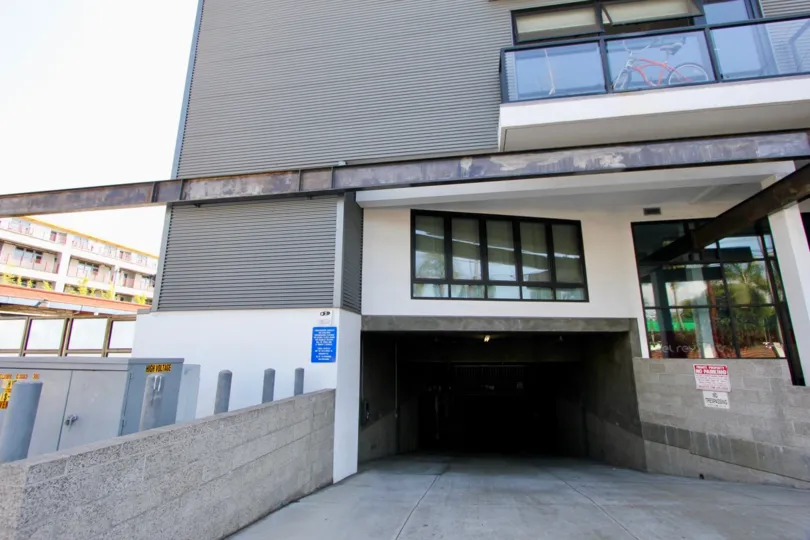 A parking garaged underneath windows of Del Rey Lofts in Venice, CA