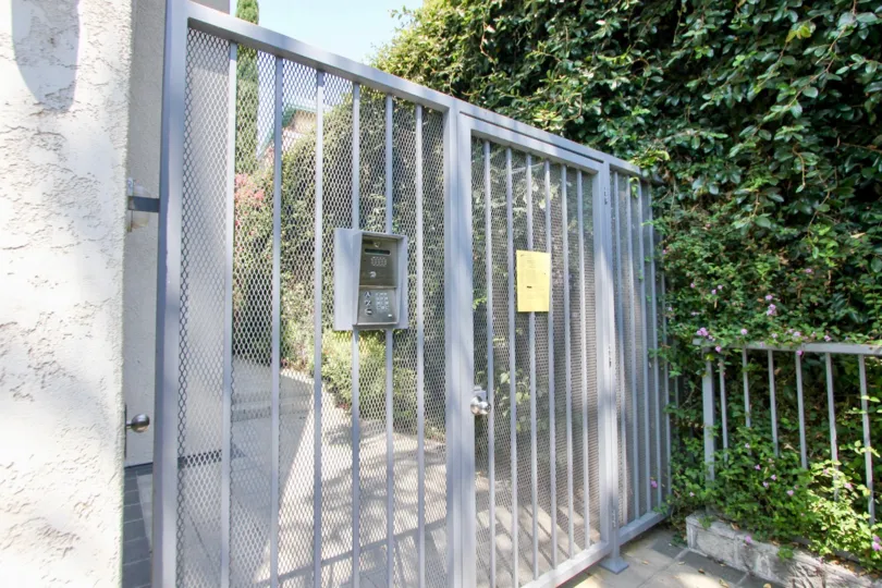 A metal security door outside the 1021 Westmount community