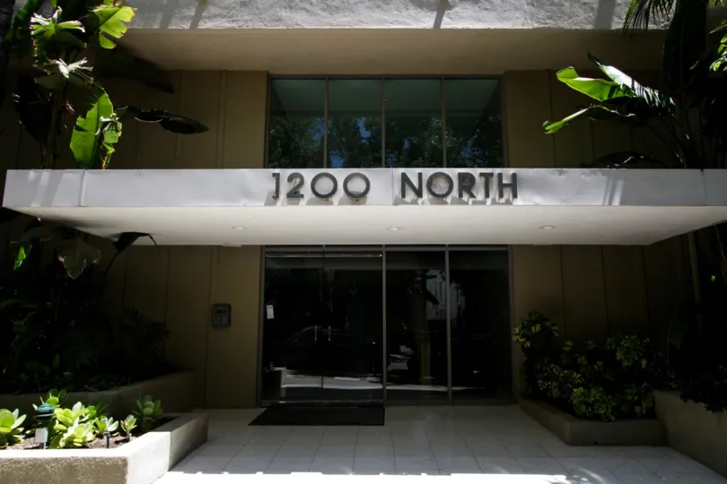 The address of 1200 N Flores on the building