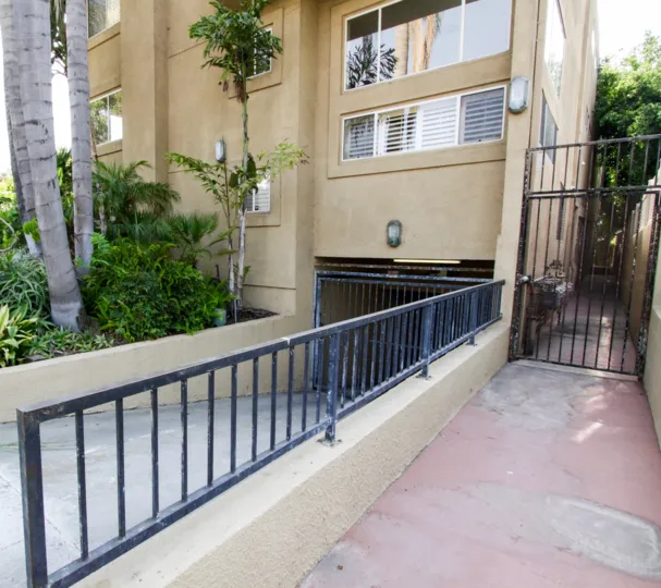 The sidewalk beside Alta Vista Gardens