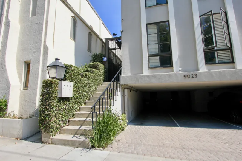 Stairs & parking level of townhouse in Cynthia Townhouse, West Hollywood, California