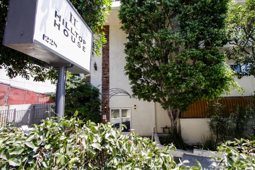 The Hilltop House name written outside the building