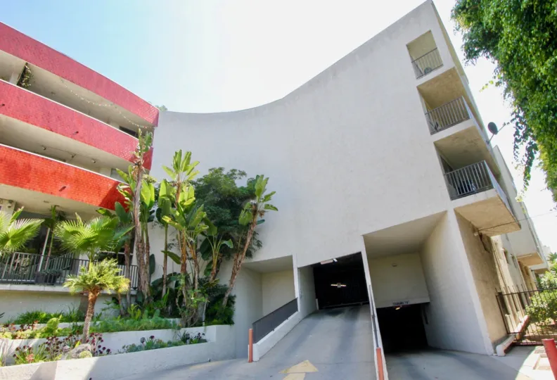 Driveway and entrance to parking facilities of Horn Plaza community