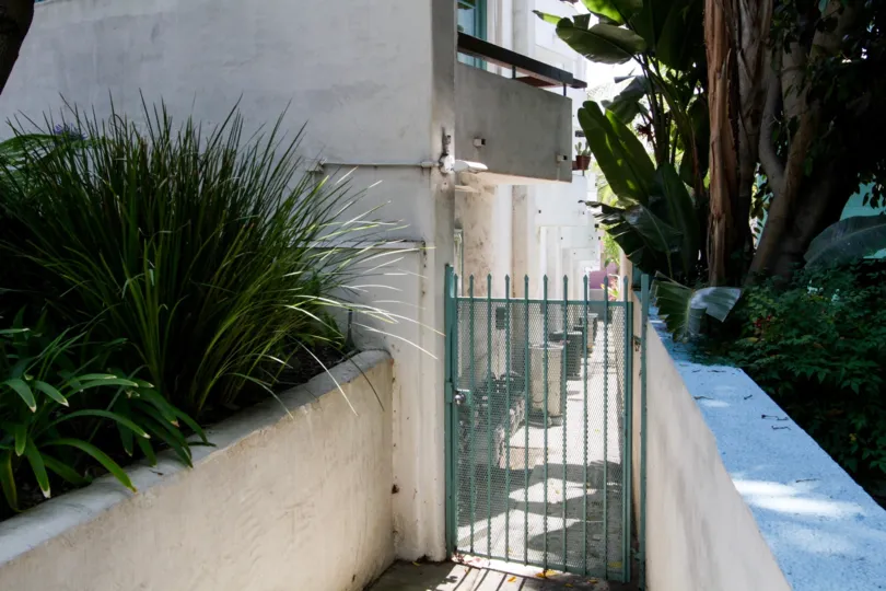 The gated side entrance into La Villa De Torre in West Hollywood