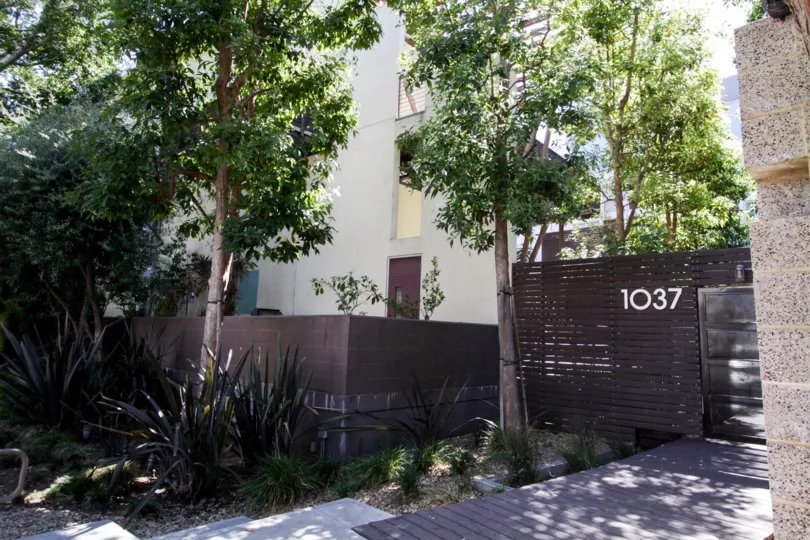 The fence around the property of Laurel Court Lofts
