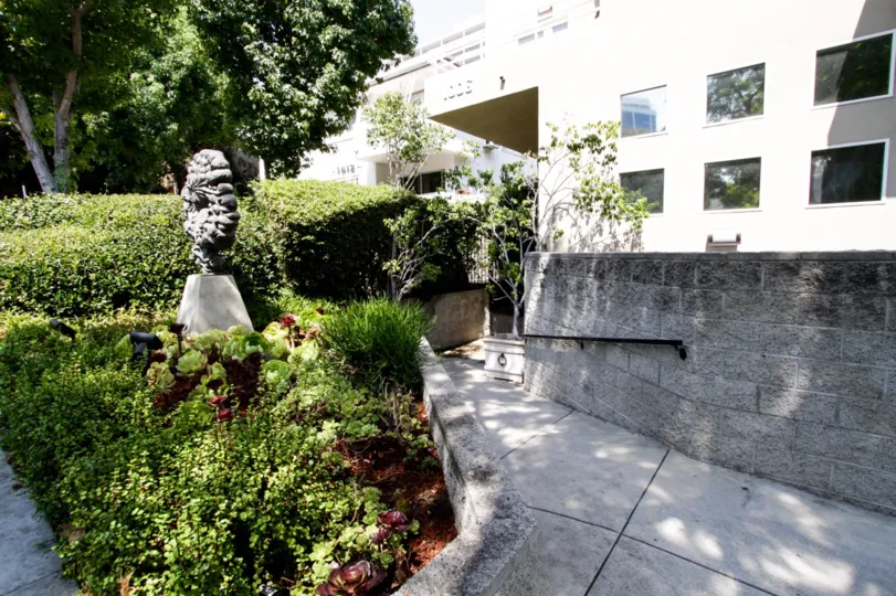 The statue in the Nouveau West Villas landscaping