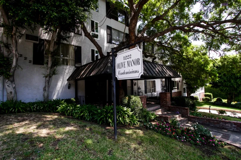 The sign welcoming you into Olive Manor
