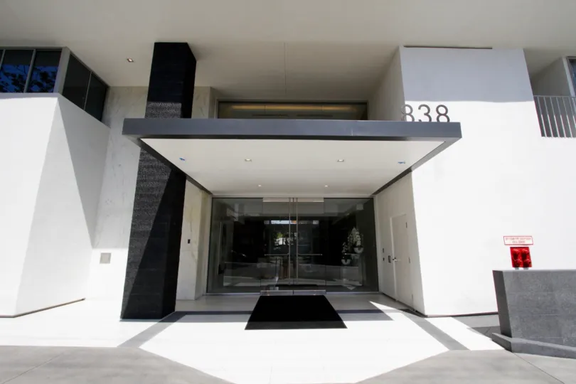 The address of Plaza Towers written above the entrance