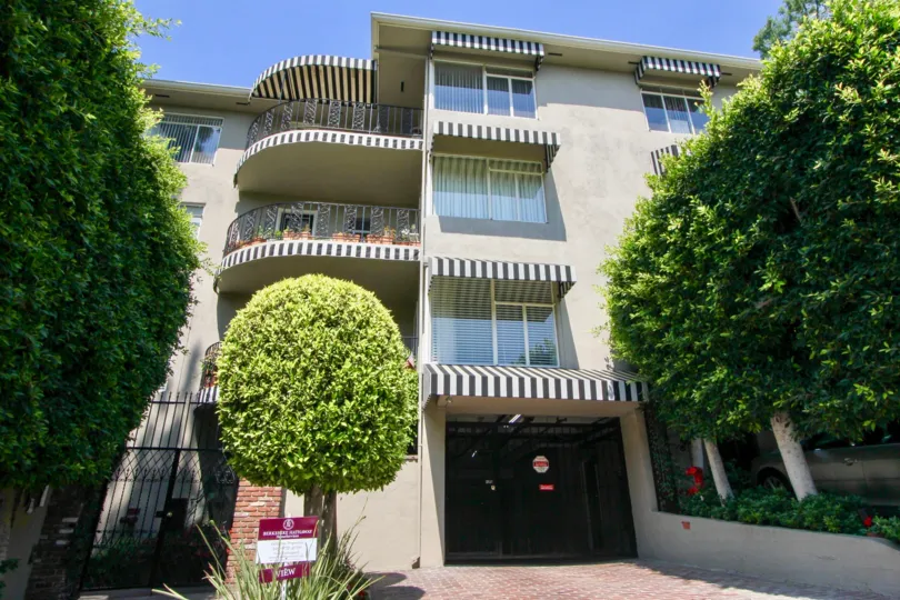 Front exterior of Sunset Plaza Terrace with some trees in West Hollywood, California