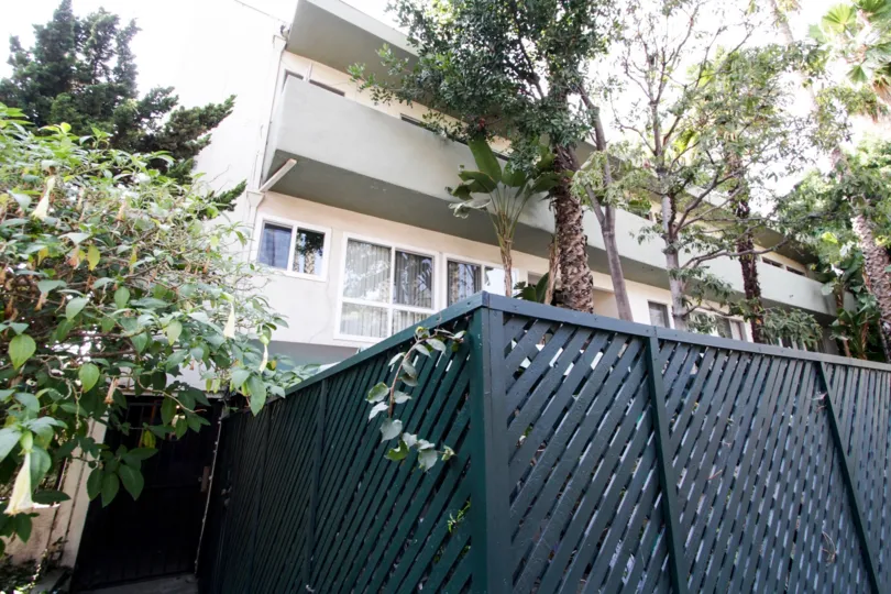 The privacy fence around The Hayworth