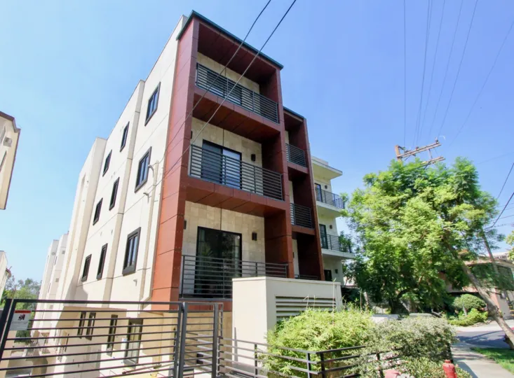 a building with 4 floors in The Shoreham Villas in a sunny day