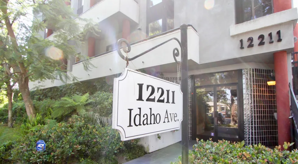 Leafy front view of the building at 12211 Idaho in West LA, California