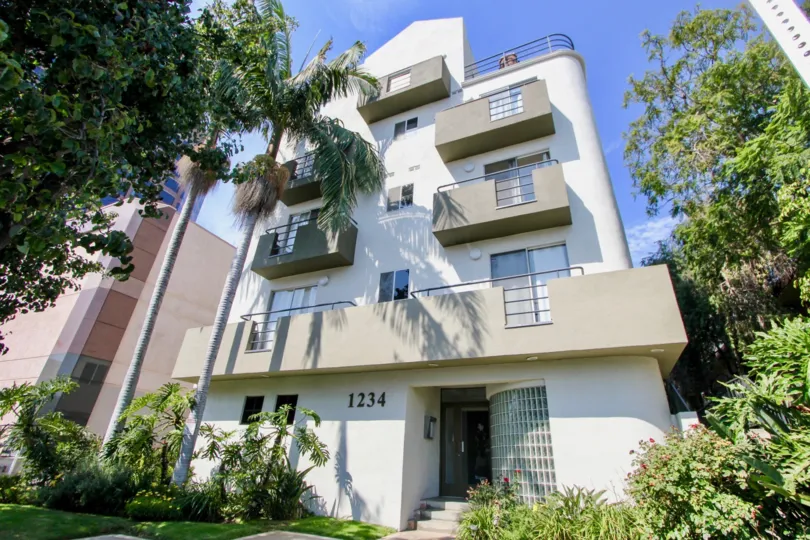1234 Granville, west la, California is A beautiful sky high well construct building which have elegant colour and shiny bright glass windows. Lots of green trees enhance its beauty. A sunny bright day give it an amazing look.