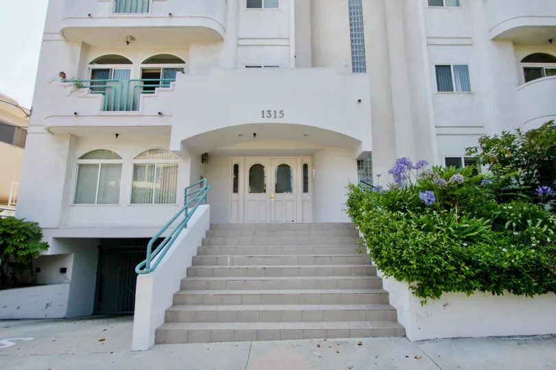 1315 Saltair, with multiple balconies and light blue railings