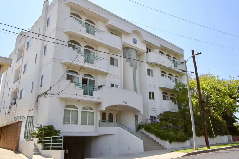 a front view of Saltair homes in west la, electric lines near by