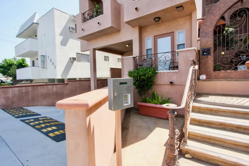 A sun kissed staircase and key code box at 1629 Armacost in West LA.