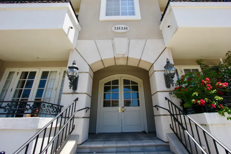 the front door of a house in 1818 Colby in a sunny day