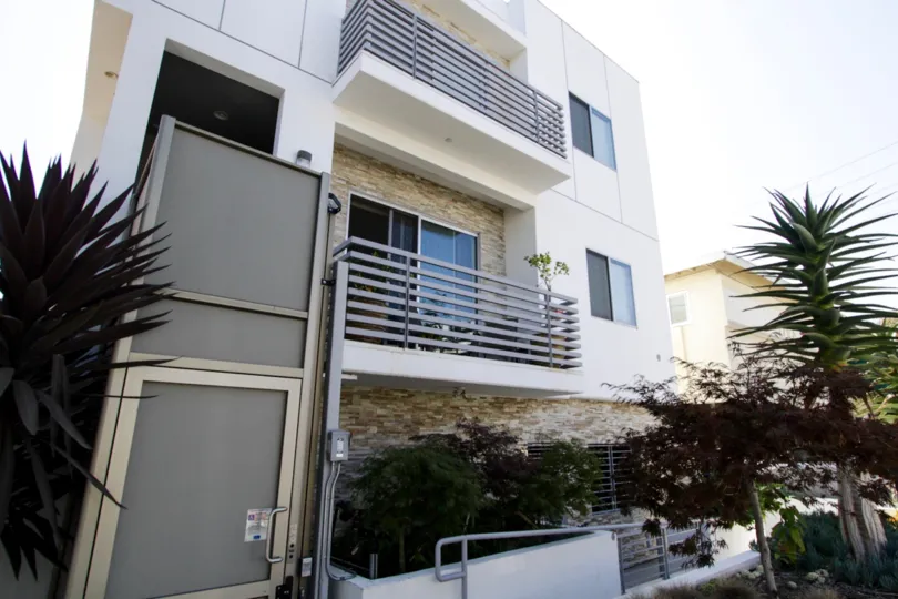 The security latch on the side entrance of Armacost Townhomes in West LA
