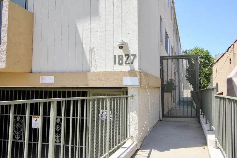 A very rare view of the security entrance an of 1827 Barrington West Gardens Apartments, West LA, California