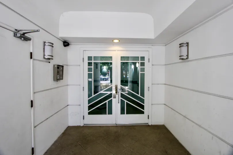 White clean entrance to Bentley Manor apartment, West La, Caliofornia