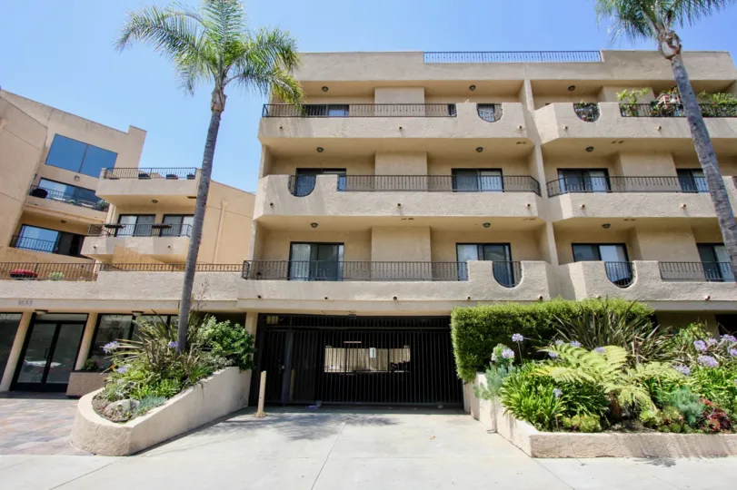 Modern Condo fronted by Palm Trees located in Bentley Regency, West LA