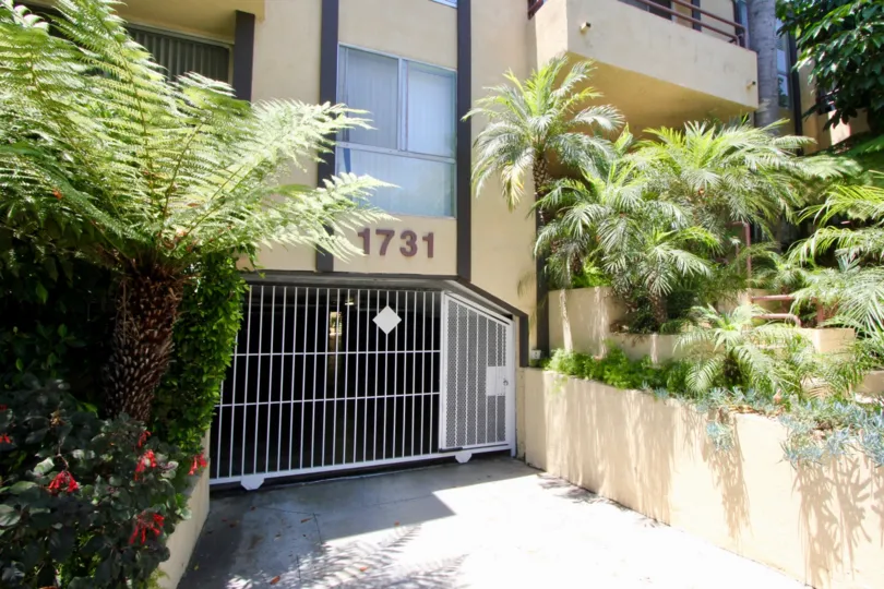 Daytime view of the gate entrance of Brentwood Terrace in West LA.