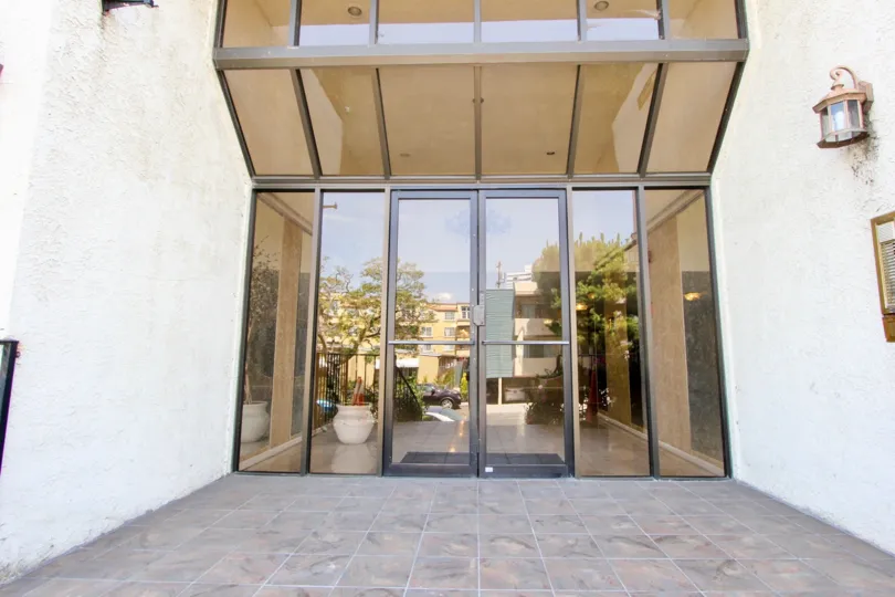 The amazing glass entrance to Brockton Plaza, West La, Valifornia