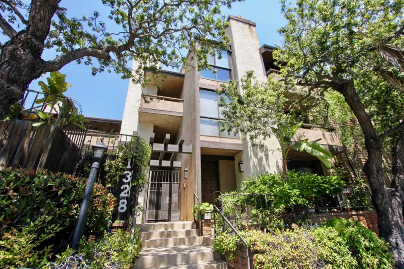 Landscaped gardens frame the entrances of Bundy Townhomes in West LA.