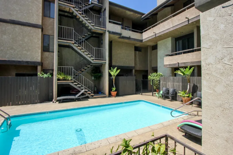 Close view of a Bundy Townhomes building and her amazing pool West la, California