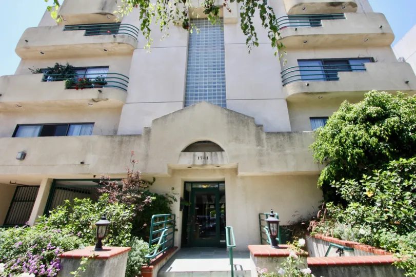 Landscape in front of the modern Colby Luxury Condominiums