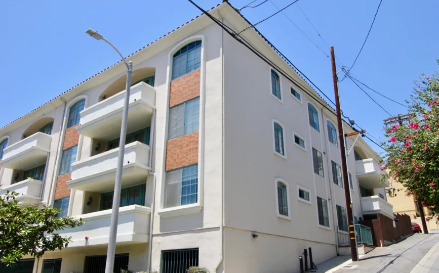 Street view of the beautiful and tall Colby Regency apartment, West La, California
