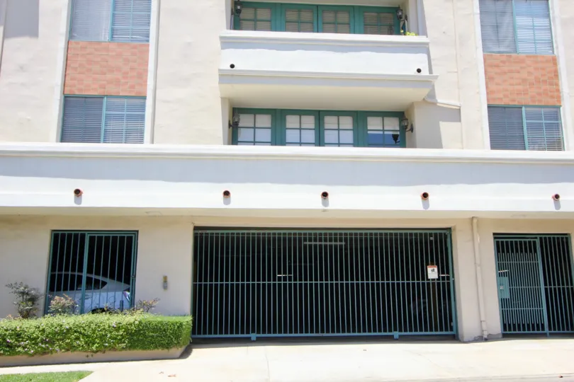 Gated entrance and patio of the Colby Regency, West La, California
