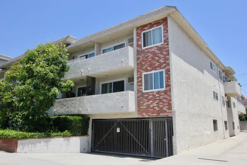 The daylight view of Colby Terrace's entrance in West LA in California. Surrounded by bushes and trees