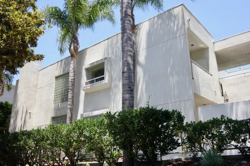 Shady apartment complex with palm trees at Purdue Pacific