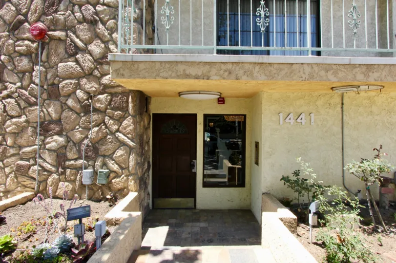 The apartments in beautiful Regency chateaux, stone wall with a small balcony