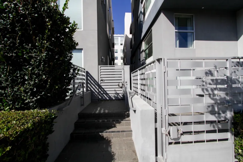 The privacy fence around Soho Square units in West LA