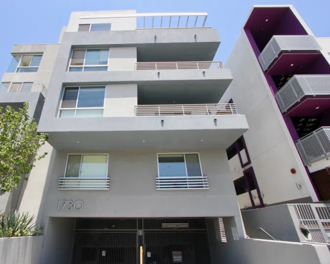 Purple colored Corridor in a 4 story building with a pent house at St Johns wood in West LA California