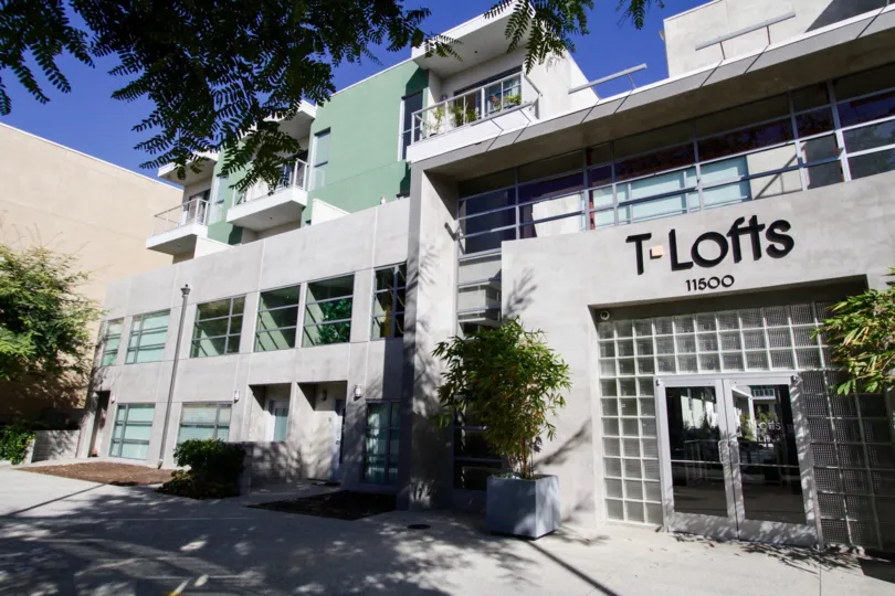 The potted plants around the entrance of T Lofts
