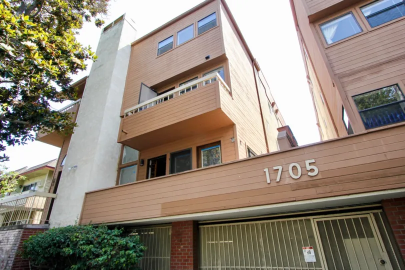 Distinctive treelined entrance to Westgate Townhomes II
