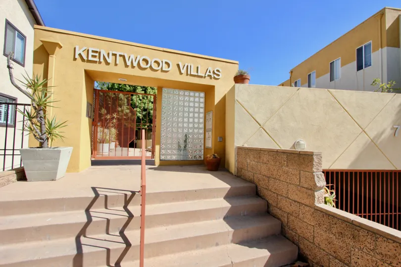 The name of Kentwood Villas above the entrance