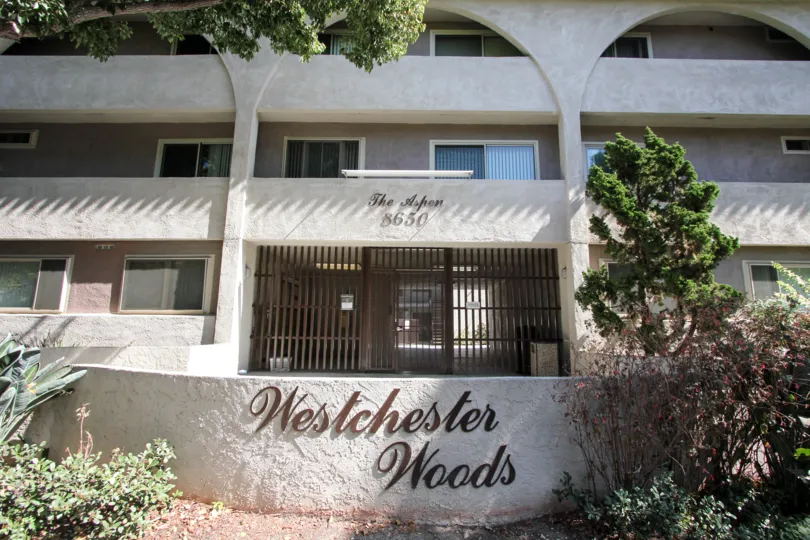 The Westchester Woods name on the building