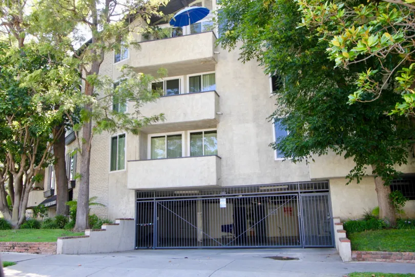 Underground garage entrance below 3 story apartment complex in Westwood, California.