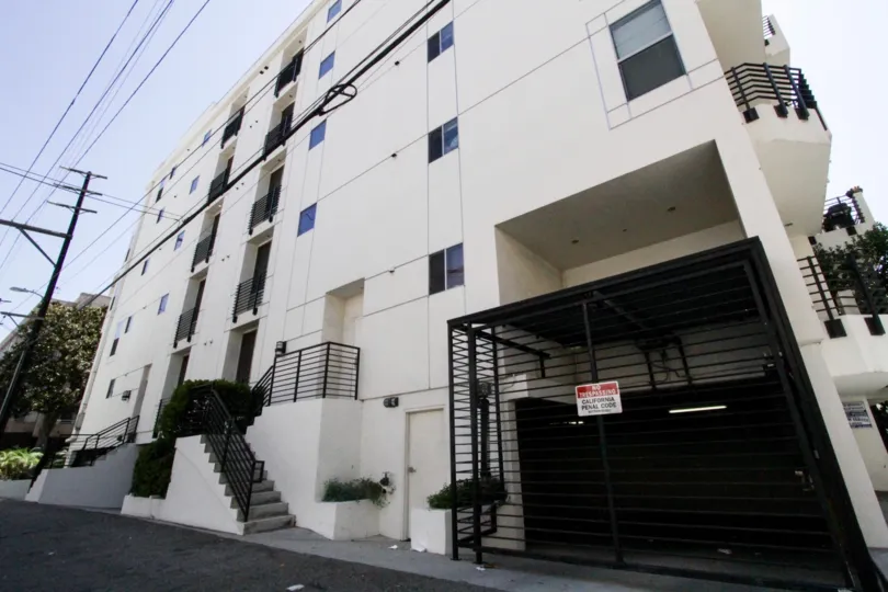 The gated parking for 10911 Wellworth in Westwood