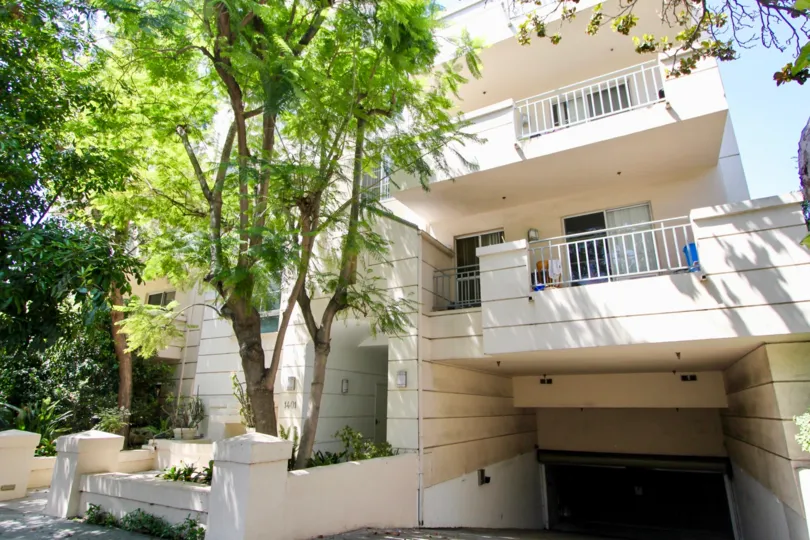The Building with the long trees and balcony and parking in 1401 Bentley of Westwood in CA